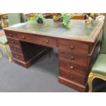 A 19th century mahogany partners desk with leather inset top, 77 x 153 x 100cm