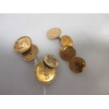 Two pairs of cufflinks made of various yellow precious metal coins (23g)