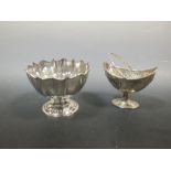 A rose bowl with undulating rim and and octagonal divides in doomed foot, 18cm diameter,