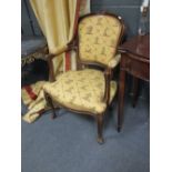 A pair of Louis XV style open armchairs and a small George I style wingback armchair, a sofa, all