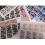 Modern Royal Mail stamps, unused, in commemorative booklets and packs, part blocks, and smilers,