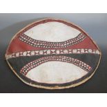 A Masai and Nandi cow hide shield