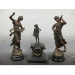 A slate mantle clock together with a pair of spelter figures after Moreau