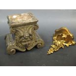 A Florentine gilt wood wall bracket and an angel head plinth (2)