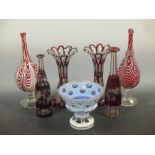 A pair of ruby glass lustres (lacking drops), decanters (lacking stoppers), Venetian style vases and