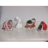 Three Royal Crown Derby paperweights; two beavers and a robin and a Staffordshire beaver (4)