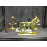 A pair of Rocco style gilt metal candlesticks, a hunting horn, a model of two black stallions and