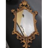 A Florentine gilt framed mirror, 74cm high