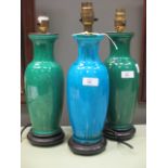 Three modern Chinese style bedside lamps, 29cm high (3)