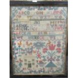 An 1869 sampler 40 x 31cm