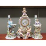 Meissen style clock and candlesticks