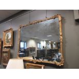 A Louis XV style giltwood wall mirror, 100 x 128cm