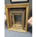 A collection of gilt frames
