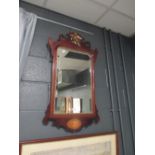 A mahogany cutwork mirror with phoenix cresting, 90cm high