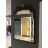 A Waring and Gillow mahogany cut work mirror with shell cresting 97cm high