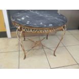 A French circular marble top and ironwork garden table