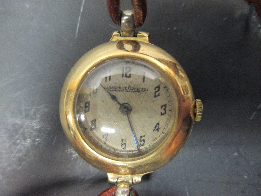 A lady’s vintage 18ct gold Jaeger-le-Coultre circular wristwatch and three Kennedy half dollars, the - Image 4 of 4