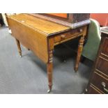 A 19th century mahogany Pembroke table on turned legs, 72 x 98 x 56cm, closed