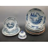 A pair of 18th century Delft blue and white plates, painted with ducks in a Chinese landscape,