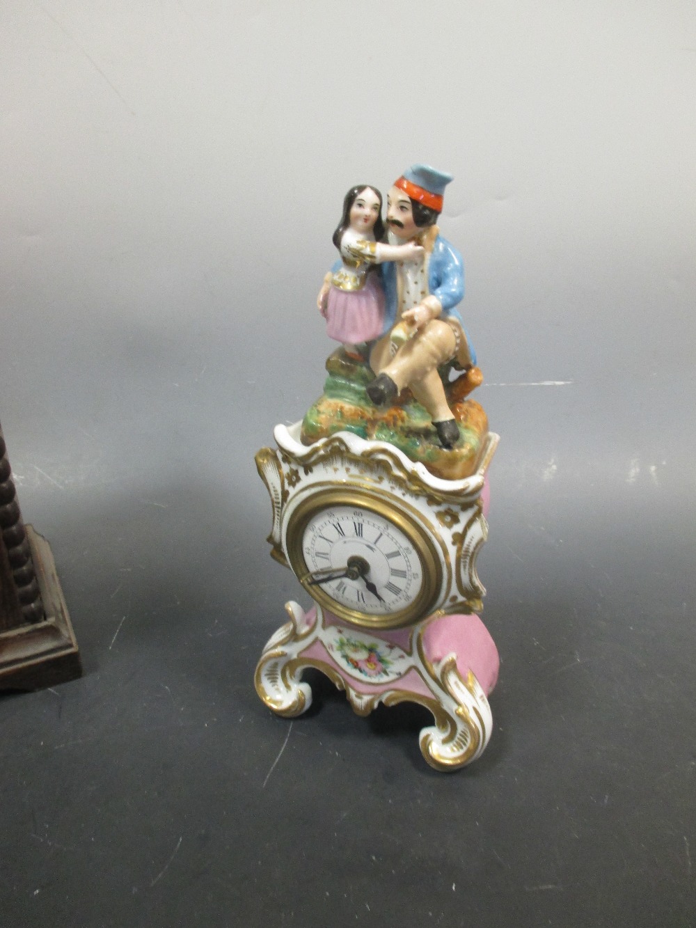 A Paris porcelain encased clock surmounted by a figure, together with a wooden cased clock (2) - Image 5 of 5