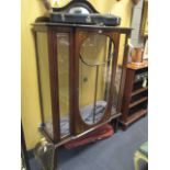 An Edwardian mahogany display cabinet, the cresting with a mirror, 180 x 107cm