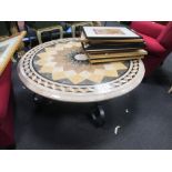 A circular marble topped coffee table, 108cm diameter