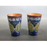 Two Royal Doulton Queen Victoria stoneware diamond jubilee beakers