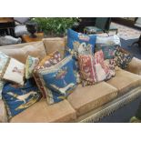 A collection of needlework cushions (12)