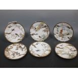 A set of six Japanese hand painted plates