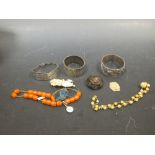 Amber beads, three silver bangles and other jewellery