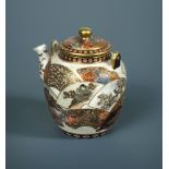 Yabu Meizan, a Satsuma miniature teapot and cover, the ovoid body painted with fan leaf reserves