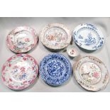 Two 18th century blue and white, four famille rose plates and a tea bowl , variously painted with