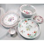 A Kangxi famille verte dish, a tea bowl, a Yongzheng famille rose saucer and a basket and stand,