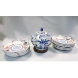 A set of nine 19th century Imari plates together with a Chinese blue and white covered jar with wood