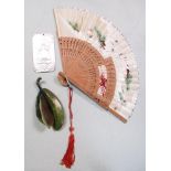 A silver plaque, hardstone banana and a boxed fan. the rectangular plaque cast with the Buddha