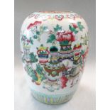 A late 19th/early 20th century famille rose jar, the ovoid shape painted on one side with Buddhist