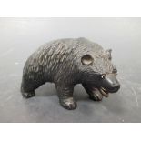 A Black Forest carved wooden bear