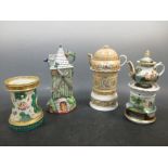 Three Paris porcelain veilleuses together with a chimney on stand