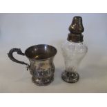 A 19th century silver half pint mug and a mounted glass caster