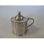 A George lll silver drum mustard by Henry Chawner, London 1790, of plain form with reeded borders