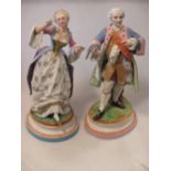 A pair of French bisque porcelain figures