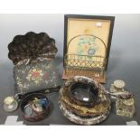 A collection of papier mache wares, a brass letter rack, inkwells etc