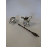 A George III silver cream jug and a toddy ladle