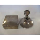 A silver capstan inkwell and a silver cigarette box (2)