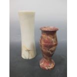 A dark pink marble urn and a modern tall tapering marble urn (2)