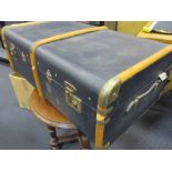 A 1940's bentwood canvas steamer trunk