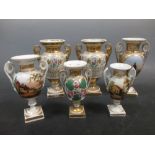 A pair and four other Paris porcelain baluster vases