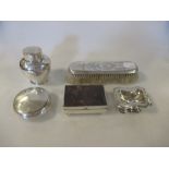 A group of silver to include a brush, circular snuff box, salt, cannister and a tortoiseshell