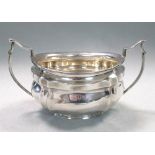 A George V two handled sugar bowl by Fordham & Faulkner, Sheffield 1913, oval and somewhat