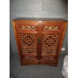 A late 19th/early 20th century Chinese cabinet, 121.5 x 98 x 38cm (47.5 x 38.5 x 15 in)